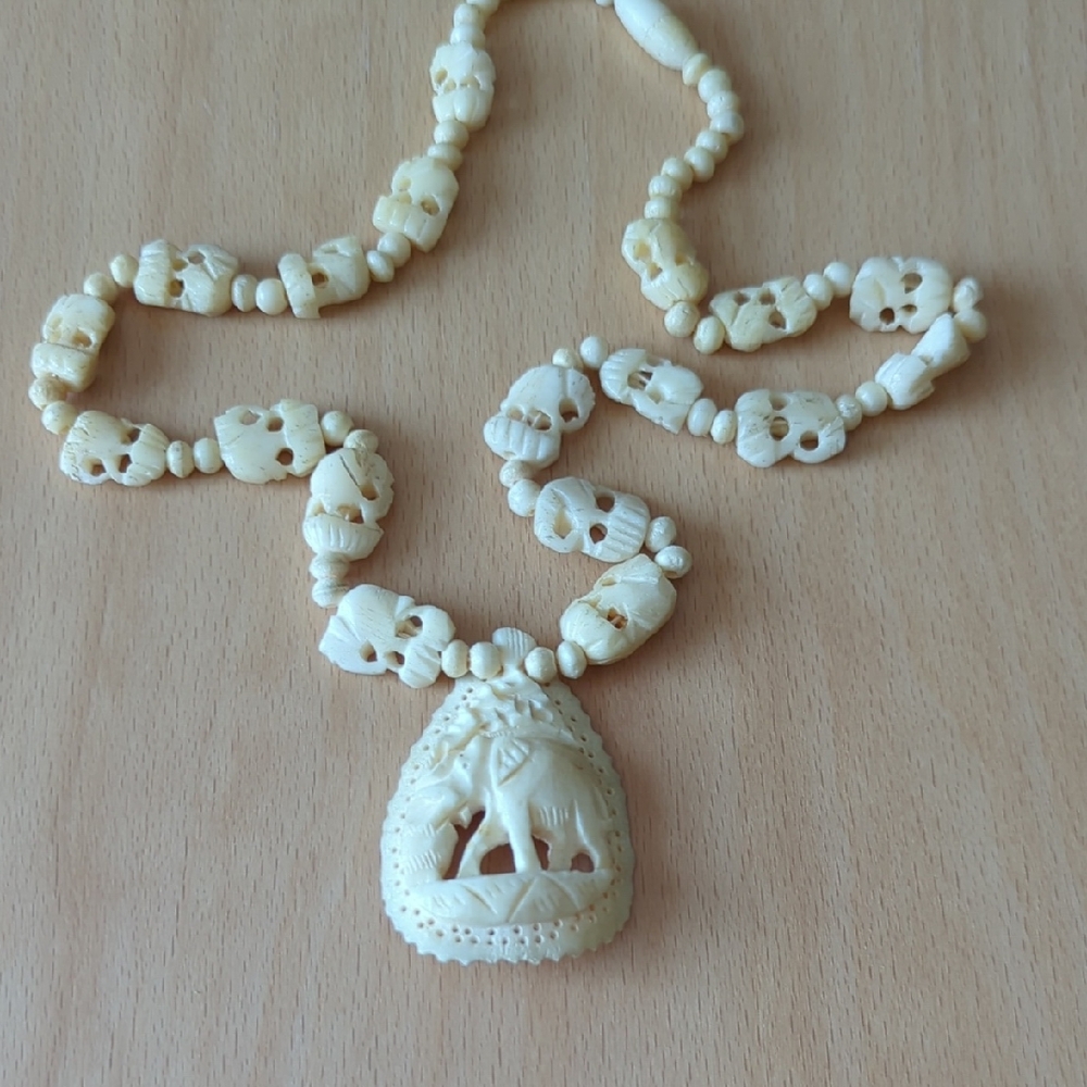 Vintage Cream Carved Bone Elephant Necklace